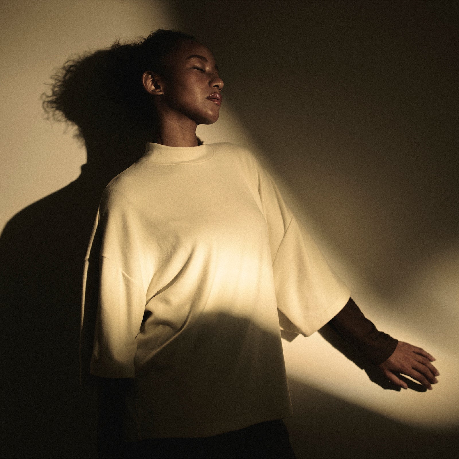 Loft モックネック七分袖トップ_70190_fw25 | Tani | とろけるような着