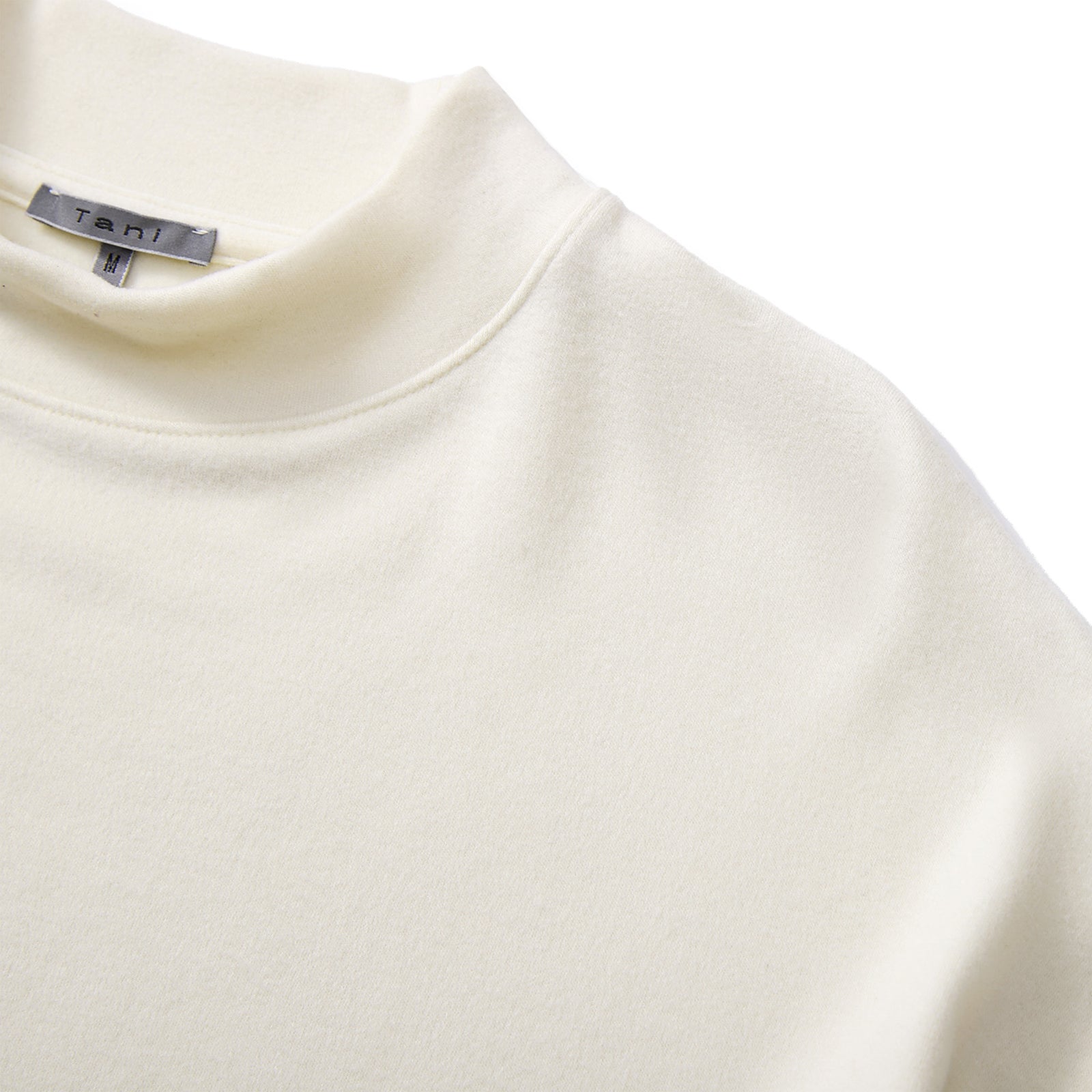 Loft モックネック七分袖トップ_70190_fw25 | Tani | とろけるような着